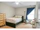 Cozy bedroom with natural light from the window, offering a comfortable and inviting space at 7818 Expedition Dr, North Charleston, SC 29420