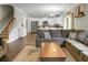 Open-concept living room and kitchen perfect for entertaining guests at 7818 Expedition Dr, North Charleston, SC 29420