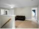 This living room includes a ceiling fan, sofa, and neutral paint at 7818 Expedition Dr, North Charleston, SC 29420