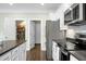 Open pantry features wire shelving and hardwood floors at 7818 Expedition Dr, North Charleston, SC 29420