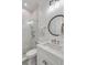 Bathroom featuring a frameless glass shower with gray and white patterned tile flooring at 904 Middle St, Sullivans Island, SC 29482