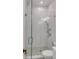 Bathroom featuring a frameless glass shower with gray and white patterned tile flooring at 904 Middle St, Sullivans Island, SC 29482