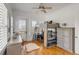 This bedroom has a unique loft bed over a desk, offering a fun and functional space at 904 Middle St, Sullivans Island, SC 29482