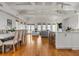 Expansive living space has an open-concept kitchen, living, and dining area with ample natural light at 904 Middle St, Sullivans Island, SC 29482