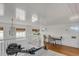 Open loft space with views, wood floors, and shiplap ceiling. A bright space for working from home at 904 Middle St, Sullivans Island, SC 29482