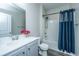 Bathroom featuring a single sink, cabinet, a full mirror and a shower-tub combo, offering a functional design at 9723 Flooded Field Dr, Ladson, SC 29456