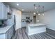 Bright kitchen featuring modern appliances, granite counters and a large central island at 9723 Flooded Field Dr, Ladson, SC 29456