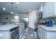 Functional kitchen featuring modern appliances, granite counters, and an efficient layout at 9723 Flooded Field Dr, Ladson, SC 29456