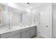 Modern bathroom with dual sinks, granite countertops, and a spacious shower at 1027 Swamp Rose Run, Summerville, SC 29485