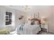 Cozy bedroom featuring soft lighting, a playful decor and plush bedding at 1027 Swamp Rose Run, Summerville, SC 29485