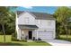 Charming two-story home features a welcoming front porch and attached two-car garage at 1027 Swamp Rose Run, Summerville, SC 29485