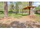 Expansive backyard featuring a unique treehouse structure, perfect for outdoor play and relaxation at 103 Arbor Rd, Summerville, SC 29485