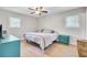 Comfortable bedroom with a ceiling fan, natural light and a light colored wood floor at 103 Arbor Rd, Summerville, SC 29485