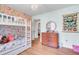 Bright bedroom decorated with floral wallpaper, bunkbeds, and lots of natural light at 103 Arbor Rd, Summerville, SC 29485
