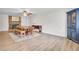 Spacious dining room featuring a brick fireplace and wooden table set at 103 Arbor Rd, Summerville, SC 29485