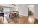 Dining room with a wooden table and benches, next to the kitchen at 103 Arbor Rd, Summerville, SC 29485