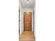 Bright entryway with wood-look floors, decorative lighting, and neutral paint at 103 Arbor Rd, Summerville, SC 29485