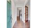 Inviting entryway with wood-look floors and a view into the home's open layout at 103 Arbor Rd, Summerville, SC 29485