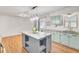 Open kitchen featuring a kitchen island with seating and updated appliances at 103 Arbor Rd, Summerville, SC 29485