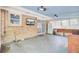 Enclosed sunroom with brick accent wall, backyard access, and plenty of space for relaxing or entertaining at 103 Arbor Rd, Summerville, SC 29485