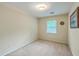 Neutral bedroom features a carpeted floor, a window, and space for relaxation at 104 Huckleberry Ln, Summerville, SC 29485