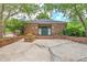 Attractive clubhouse features brick facade, double door entry and manicured landscaping at 104 Huckleberry Ln, Summerville, SC 29485