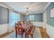 Dining room with modern decor, ample natural light, and cozy seating arrangements at 104 Huckleberry Ln, Summerville, SC 29485