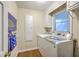 Practical laundry room with modern washer, dryer, and ample storage space at 104 Huckleberry Ln, Summerville, SC 29485