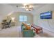 Cozy living room featuring a sofa, a TV, and ample natural light at 104 Huckleberry Ln, Summerville, SC 29485