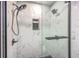 Modern shower featuring marble tiles and a sleek glass enclosure at 104 Huckleberry Ln, Summerville, SC 29485
