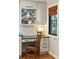 Desk area features built-in cabinets, drawer storage, and a window offering natural light at 1056 Wharf Indigo Pl, Mount Pleasant, SC 29464