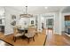 Charming dining room featuring an elegant chandelier and views to adjacent rooms and spaces at 1056 Wharf Indigo Pl, Mount Pleasant, SC 29464