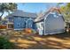 Back exterior of a two story home showing a neatly kept lawn at 1056 Wharf Indigo Pl, Mount Pleasant, SC 29464