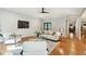 Hallway with hardwood floors, trim, and access to the rooms in the home at 1056 Wharf Indigo Pl, Mount Pleasant, SC 29464