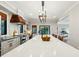 Spacious kitchen featuring a large island, modern lighting, and high-end finishes at 1056 Wharf Indigo Pl, Mount Pleasant, SC 29464