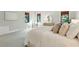 Comfortable main bedroom featuring carpet flooring, modern decor, and natural light at 1056 Wharf Indigo Pl, Mount Pleasant, SC 29464