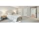 Inviting main bedroom featuring soft carpet, neutral tones, and stylish decor at 1056 Wharf Indigo Pl, Mount Pleasant, SC 29464
