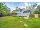 Large backyard featuring a wooden deck and two-story home at 106 Dunmow Dr, Summerville, SC 29485