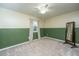 Bright bedroom featuring carpeted floor, a window, two-tone walls, and a full length mirror at 106 Dunmow Dr, Summerville, SC 29485