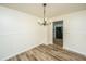 Dining area with hardwood floors, and a view into the kitchen at 106 Dunmow Dr, Summerville, SC 29485