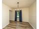 Dining room with hardwood floors, chandelier, and a large window at 106 Dunmow Dr, Summerville, SC 29485