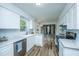 Eat-in kitchen showcases new cabinets, marble countertops and stainless steel appliances at 106 Dunmow Dr, Summerville, SC 29485