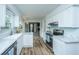 Modern kitchen featuring white cabinets, stainless steel appliances, and bright countertops at 106 Dunmow Dr, Summerville, SC 29485