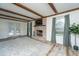 Cozy living room with a brick fireplace and exposed wood beams at 106 Dunmow Dr, Summerville, SC 29485