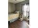 Simple bedroom with twin bed, neutral walls, and a window with natural light at 129 Bramwell Dr, Summerville, SC 29485