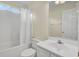 Clean bathroom featuring a tub with shower, a vanity with sink, and a large mirror at 1302 Camden Xing, Hanahan, SC 29410