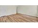 Bedroom featuring wood-look flooring and a view through the doorway of another room at 1302 Camden Xing, Hanahan, SC 29410