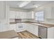 Bright kitchen with white cabinets, and stainless steel appliances at 1302 Camden Xing, Hanahan, SC 29410