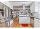 Modern kitchen with stainless steel appliances, white cabinetry, granite counters, and open layout at 1342 Dennis Blvd, Moncks Corner, SC 29461