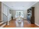 Bright living room featuring hardwood floors, large window, and stylish furniture at 1342 Dennis Blvd, Moncks Corner, SC 29461